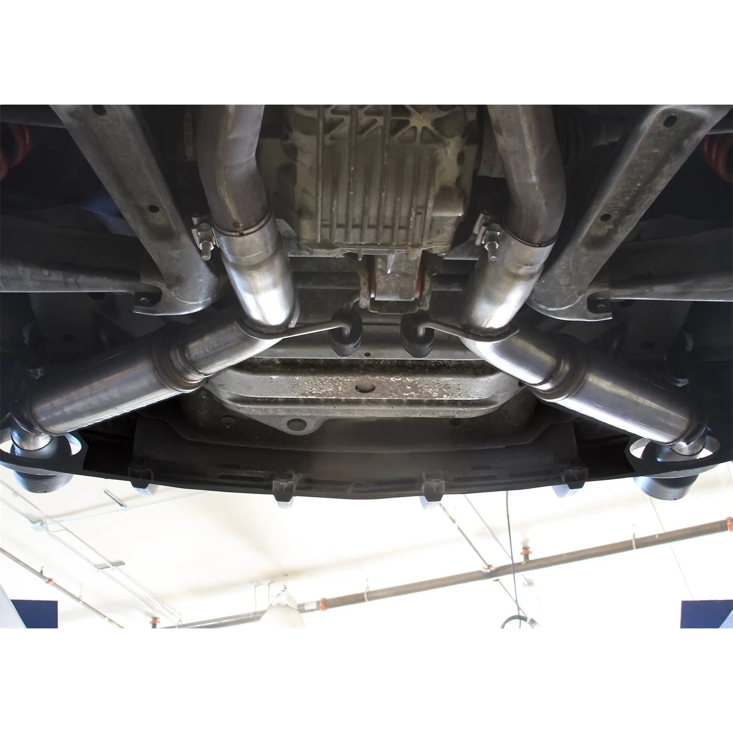 Flowmaster FlowFX Axle-Back Exhaust System - 3 in Diameter - Dual Rear Exit - 4.5 in Black Ceramic Tips - Stainless - Chevy Camaro 2010-15